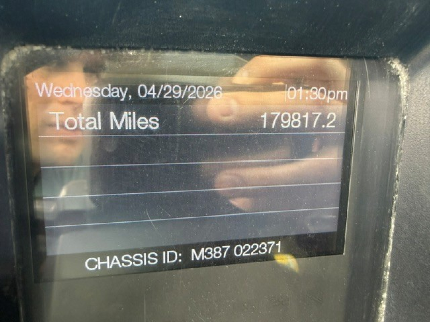 Dashboard display showing date Wednesday, 04/29/2026; time 01:30pm; Total Miles 179,817.2; CHASSIS ID M387 022371.