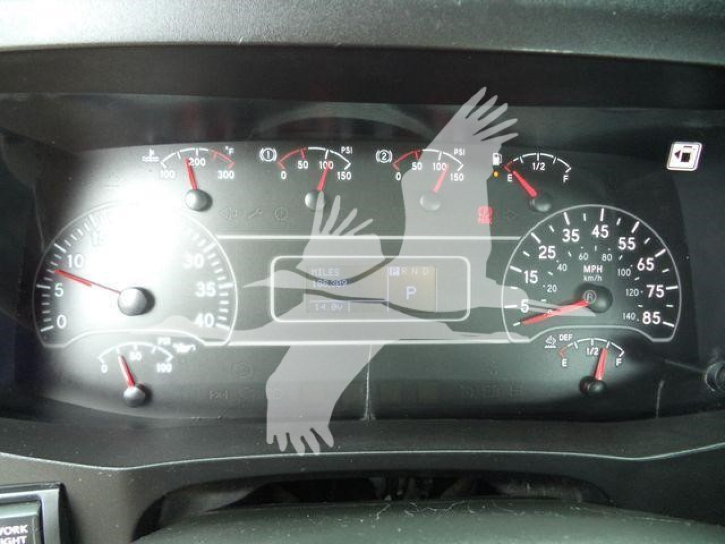 Dashboard of a 2020 International MV rollback truck showing instrument cluster with speedometer, tachometer, and various gauges.