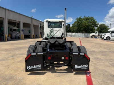 Truck rear view of a 2020 Mack AN64T day cab with dual rear tires, mud flaps labeled Bruckner Equipment, and a fifth wheel area.