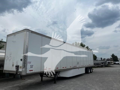 Trailer side view showing a white 53' dry van with Wabash branding watermark overlay; visible markings include 53', rear doors, and wheel area.