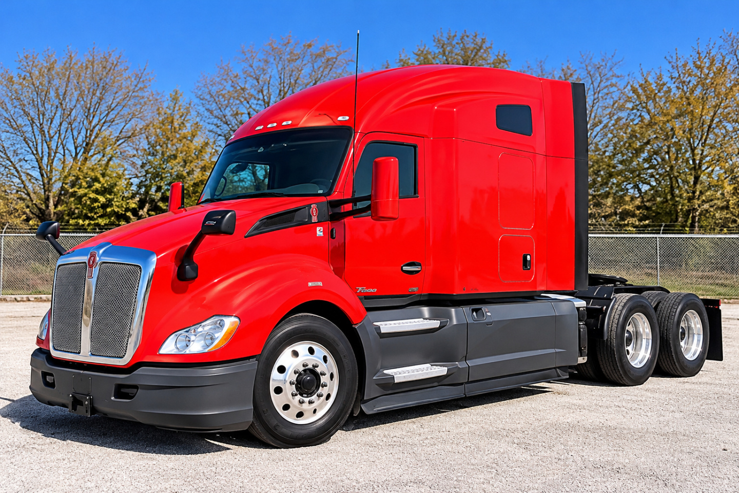 Kenworth T680 tractor trailer in red color, cab and front fender with dual rear axles, side steps, and chrome grille.