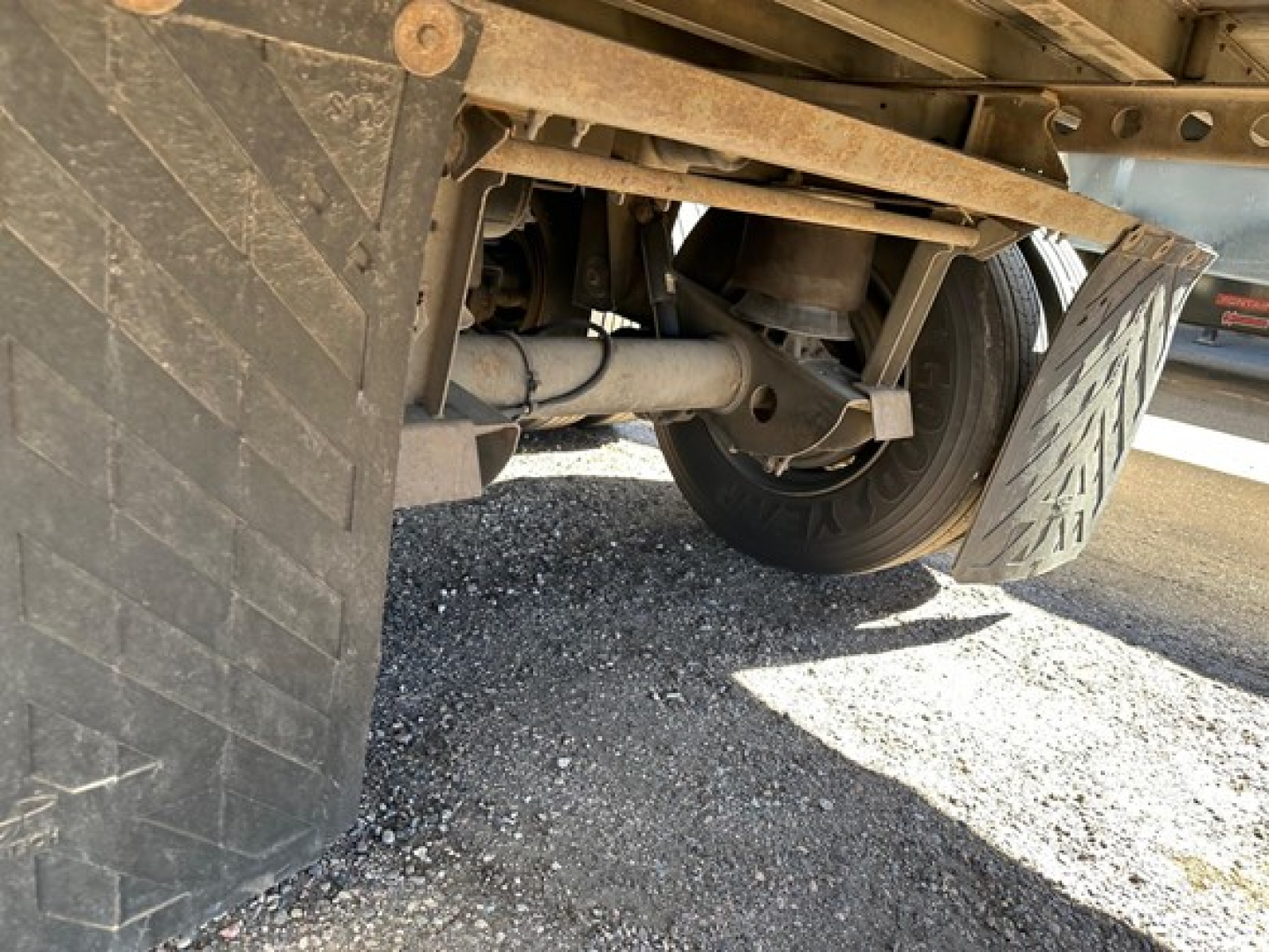 Hyundai air ride roll door dry van trailer undercarriage showing suspension and wheels.