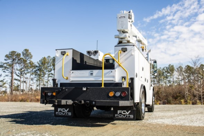 Service/Utility truck rear view showing elevator boom on a Freightliner M2 106 Plus with FCV Fouts mud flaps and white body.