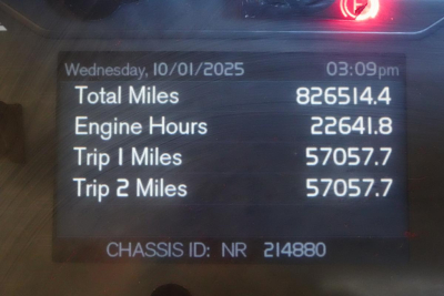 Vehicle instrument display showingTotal Miles 826514.4, Engine Hours 22641.8, Trip 1 Miles 57057.7, Trip 2 Miles 57057.7, Wednesday 10/01/2025 03:09pm, CHASSIS ID NR 214880