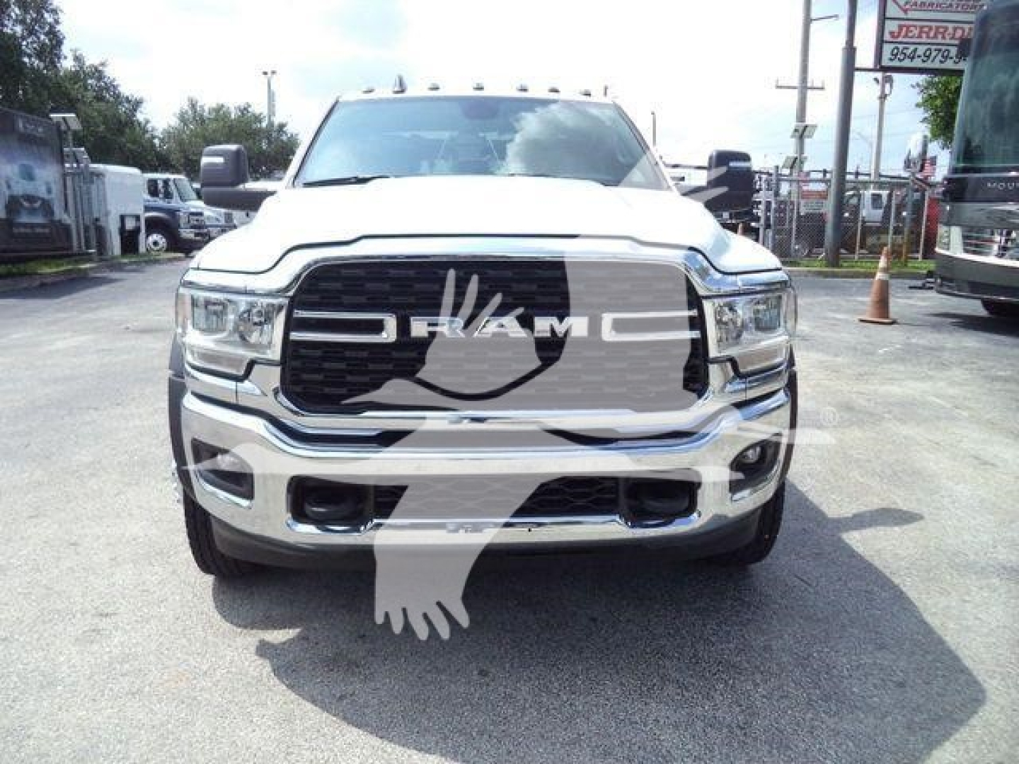 Front view of a white Ram 5500 pickup truck with prominent grille and RAM badge, winch category listing.