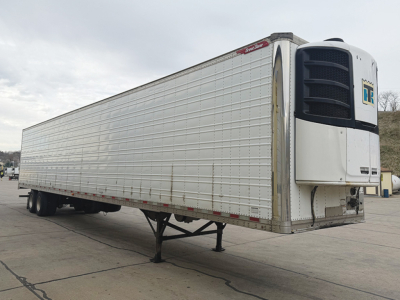 Great Dane Everest SS reefer trailer with white front refrigeration unit and silver corrugated side panels, parked at lot.
