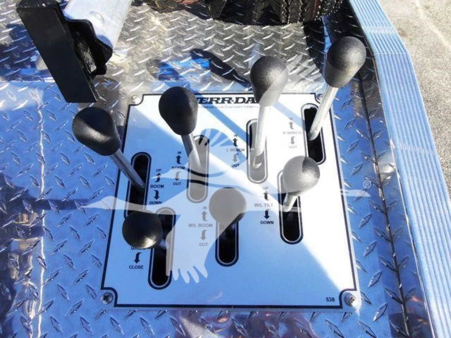 Ram 5500 SP vehicle shifter assembly with multiple gear levers and a control panel showing shift positions and labels.