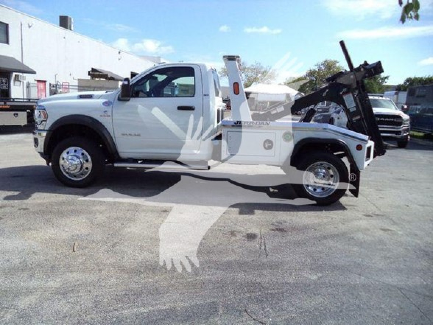 Ram 4500 tow truck side profile showing winch cradle and equipment rack