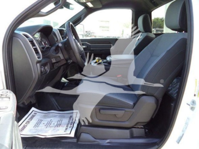 Ram 4500 SLT interior passenger and driver seats, dashboard, and steering wheel visible in a pickup truck cabin.