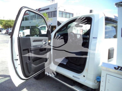 Ram 4500 SLT truck showing front and open driver door with interior view and winch category vehicle.
