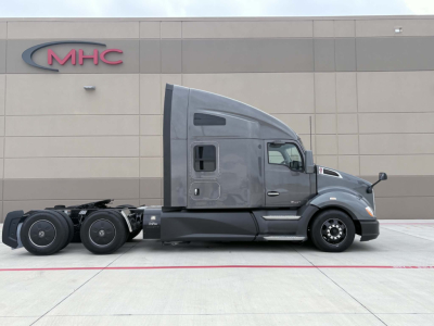 Kenworth T680 tractor in profile view showing sleeper cab and rear wheels.