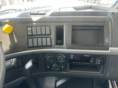 Volvo VHD dashboard interior showing various switches and a blank dash slot.
