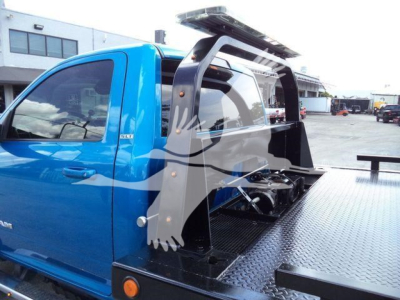 Blue Ram 5500 rollback truck cab with metal platform and tool rack, side window, side mirror, and stamped text not visible.