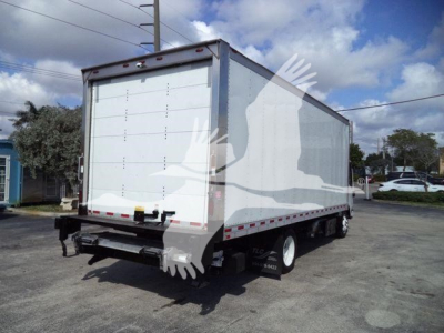 Isuzu NPR box truck rear view showing cargo box and wheels