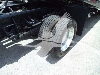 Ram 5500 chassis with dual rear wheels and exposed suspension components.