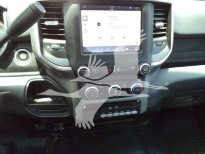 Ram 5500 interior dashboard view with central touchscreen display and climate controls.