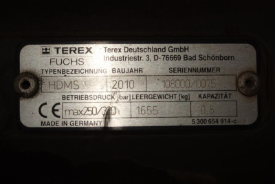 Terex HDMS plate with model designations and specs showing Terex Deutschland GmbH, Seriennummer 180000/0075, Baujahr 2010, max weight 1655 kg, Kapazität 0.8, Made in Germany.