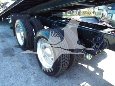Kenworth T880 truck rear chassis and dual-axle wheels showing suspension and undercarriage components.