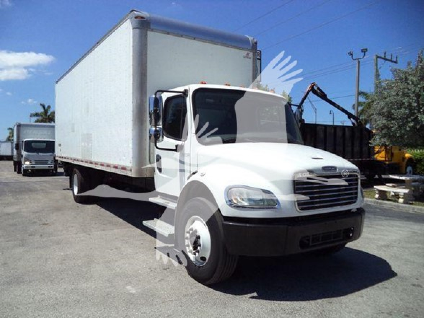 Box truck side and front view of a white 2018 Freightliner M2 106 with a large cargo box, cab, and dual rear wheels.