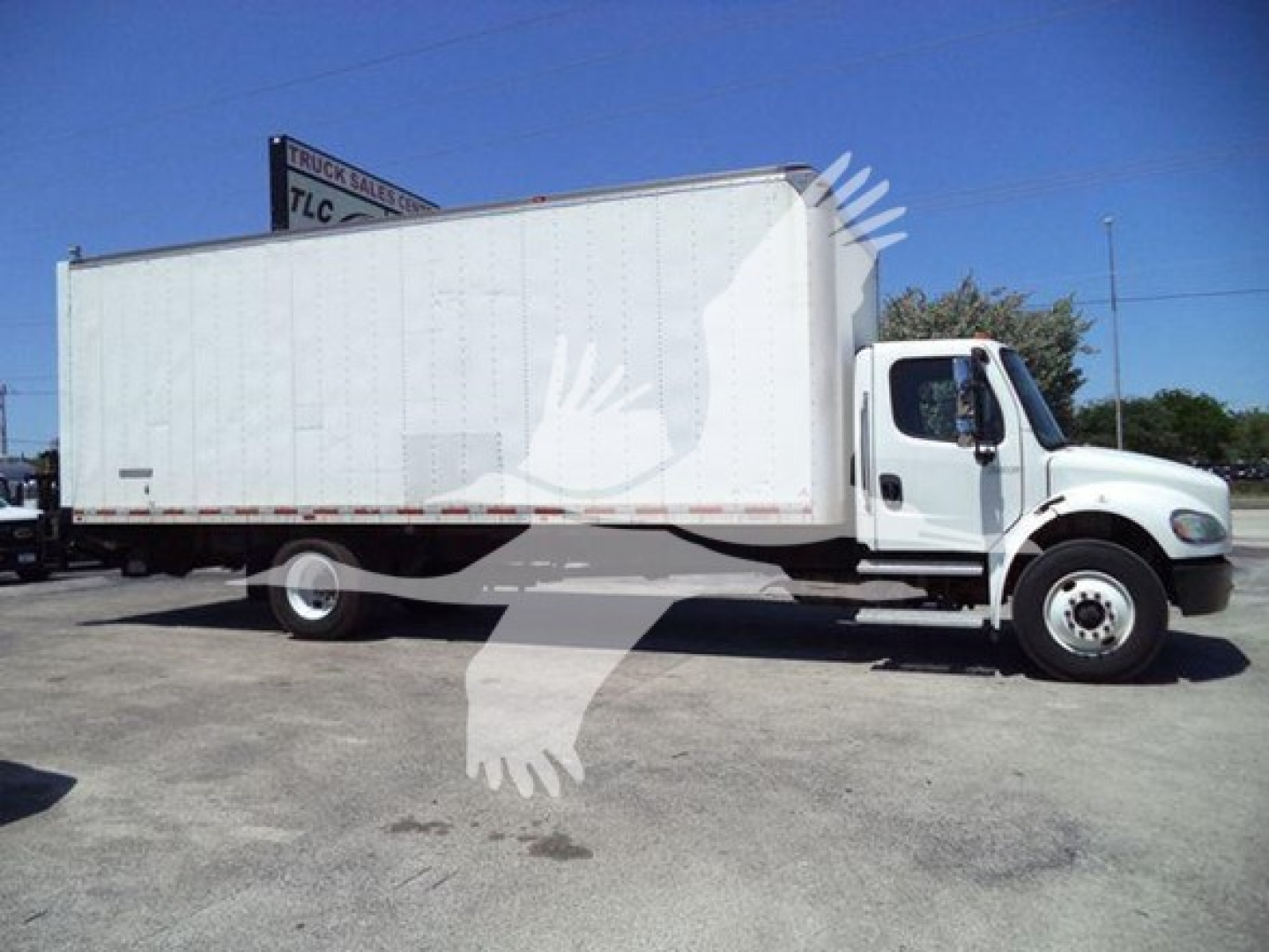 Box truck 2018 Freightliner M2 106 side view showing large cargo box and cab with white exterior.