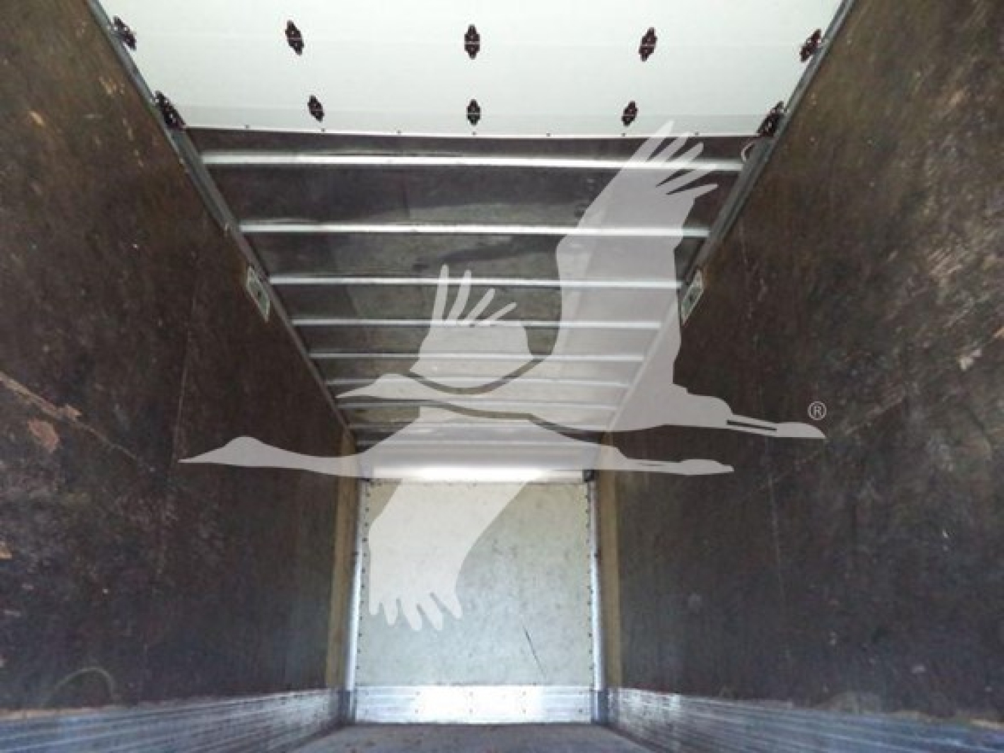 Freightliner M2 106 truck cargo area showing interior walls and metal floor, stock image with watermark.