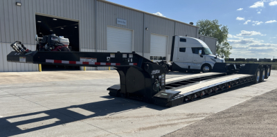 Load King 503/554 SS SF lowboy trailer with 8'-6" deck showing hydraulic winch and extended gooseneck.
