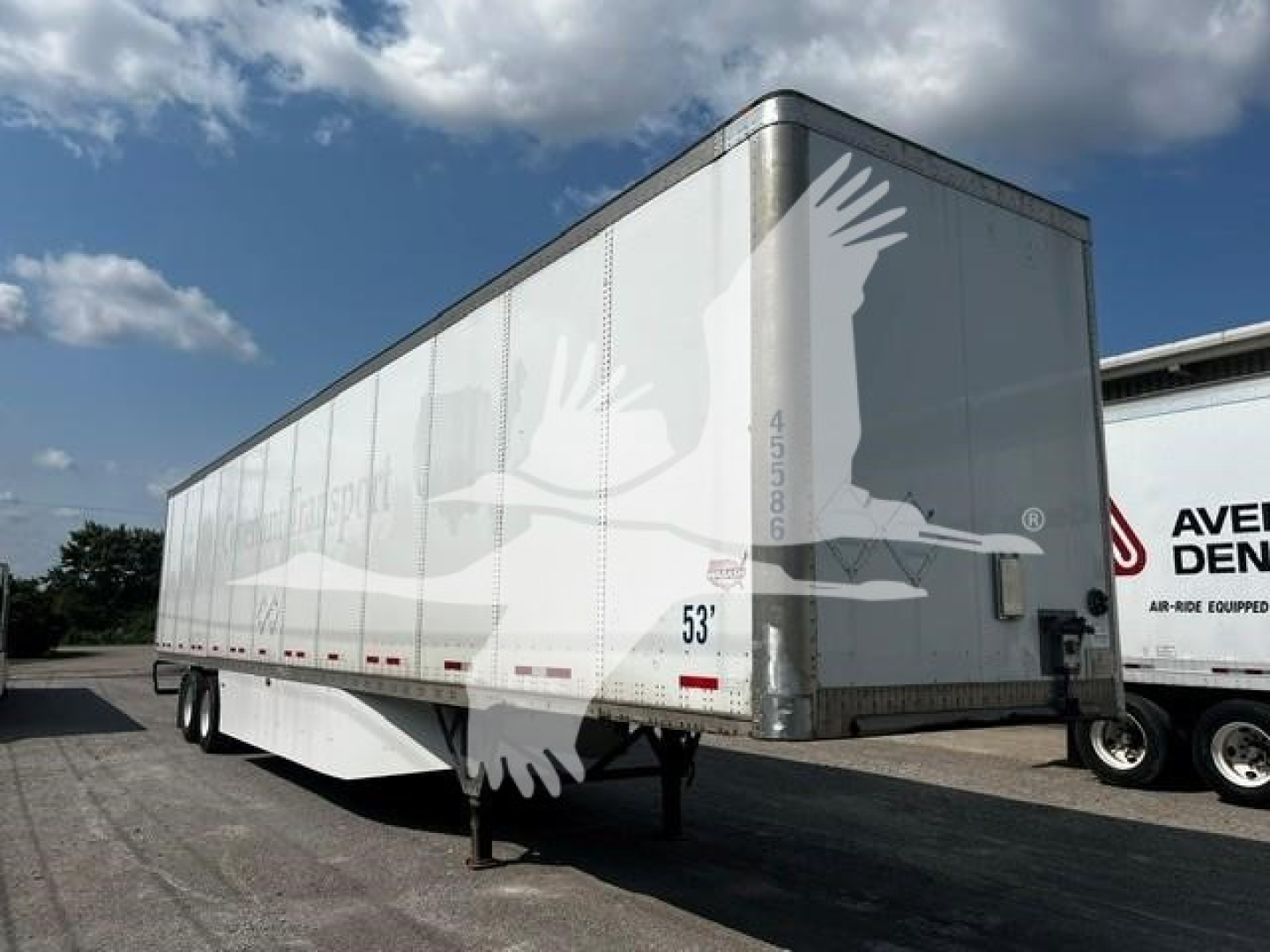 2017 Wabash van trailer viewed from side-right showing quad rear wheels and landing gear, stock 7775, VIN 1JJV532D4HL007060.