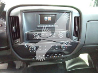 Dashboard of a new 2023 International CV truck with center touchscreen display, climate controls, and stereo/media buttons.