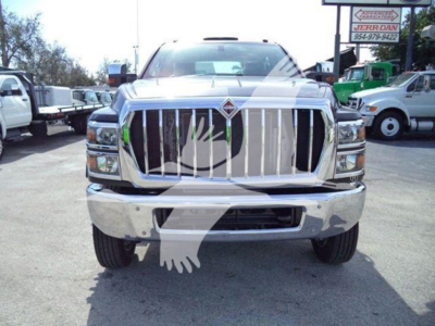 Front view of a 2023 International CV truck with chrome grille and bumper. The image shows the front of the truck, no visible text legible on the vehicle itself.