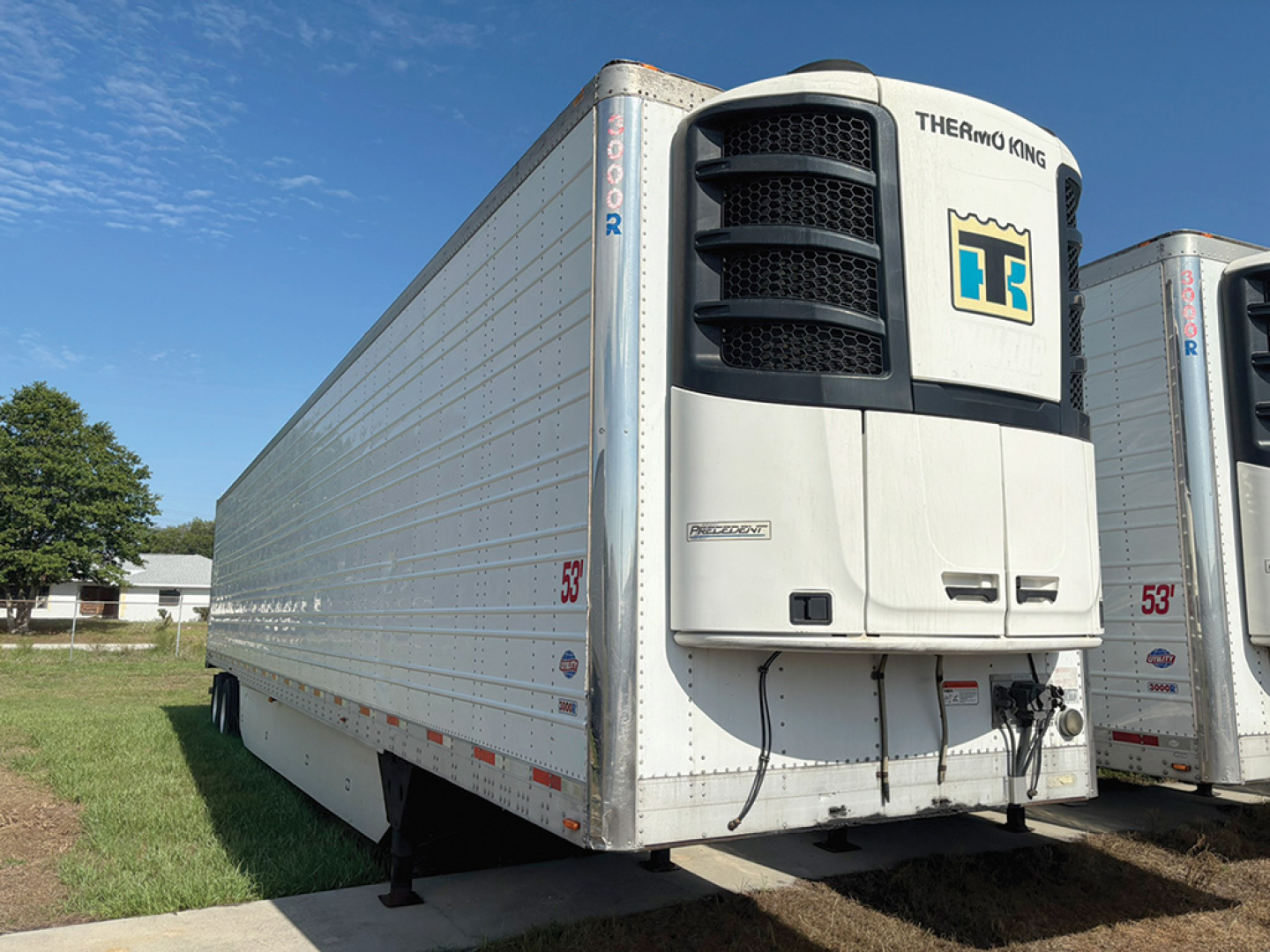Trailer side and Thermo King reefer unit on front of a 2018 Utility 3000R refrigerated trailer with Thermo King logo and 53' markings.