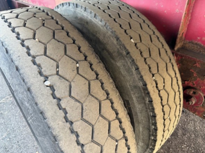Dual rear tractor tires on a 2014 Great Dane spread air combo flatbed trailer showing tread pattern and sidewall details.