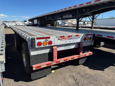 Great Dane spread air combo flatbed trailer back view showing dual rear axles and taillights