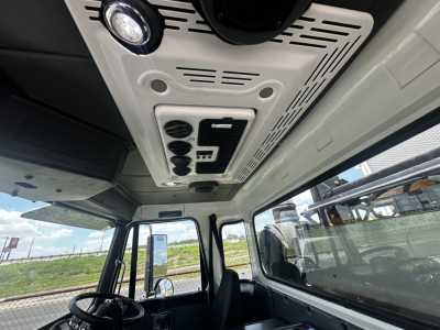 Autocar XPEDITOR cabin overhead console with controls and vents visible.