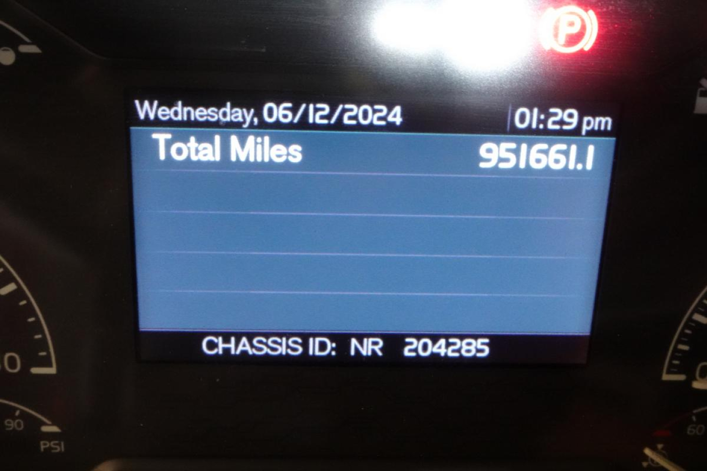 Dashboard display showing Total Miles 95166.1, date Wednesday 06/12/2024, time 01:29 pm, CHASSIS ID: NR 204285.