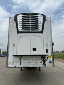 Front view of a 2016 utility reefer trailer with a large radiator grille and curved refrigeration unit, with posting numbers and VIN text not visible in image.