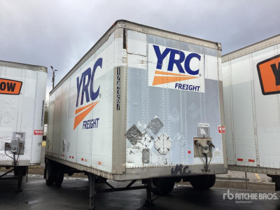 Trailer showing YRC Freight branding on a white box trailer with rear doors, in-service condition, side and back with stickers and identification numbers.
