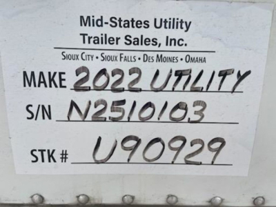Label on trailer reading Mid-State Utility Trailer Sales, Make 2022 UTILITY, S/N N2510103, STK # U90929.