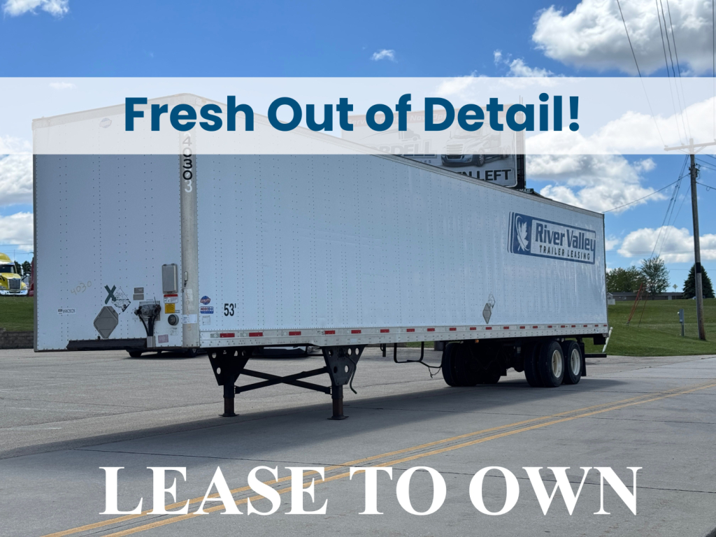 Trailer with River Valley Transport Lines branding and dual rear axles showing undercarriage and landing legs, 53' length label, white exterior.