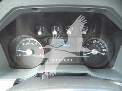 Dashboard view of a 2017 Ford F650 showing gauges and PRNDM21 gear selector.