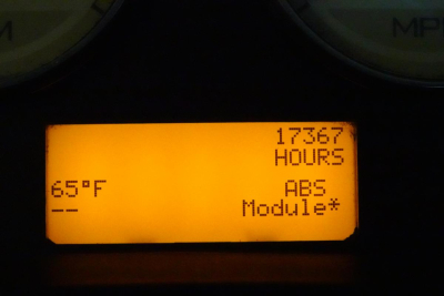 Dashboard display showing 17367 hours, 65°F, ABS, Module*, and blank -- part of a 2013 International ProStar+ 113 listing.