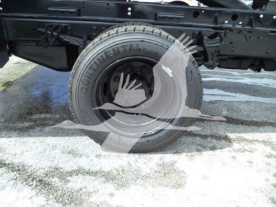 Continental tire on Silverado 6500HD chassis showing wheel and undercarriage components.