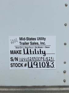 Label on trailer showing Mid-States Utility Trailer Sales, Inc. Make Utility S/N UYVS... STOCK # U91083.
