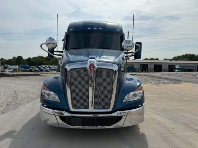 Kenworth T680 front view showing grille and bumper with chrome accents.