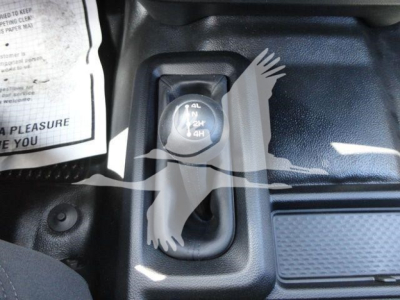 Ram 5500 interior view showing 4x4 shift knob and surrounding console area.