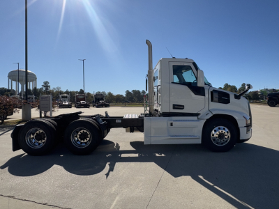 Mack PR64T tractor cab side profile showing chassis and rear axles with dual rear wheels.