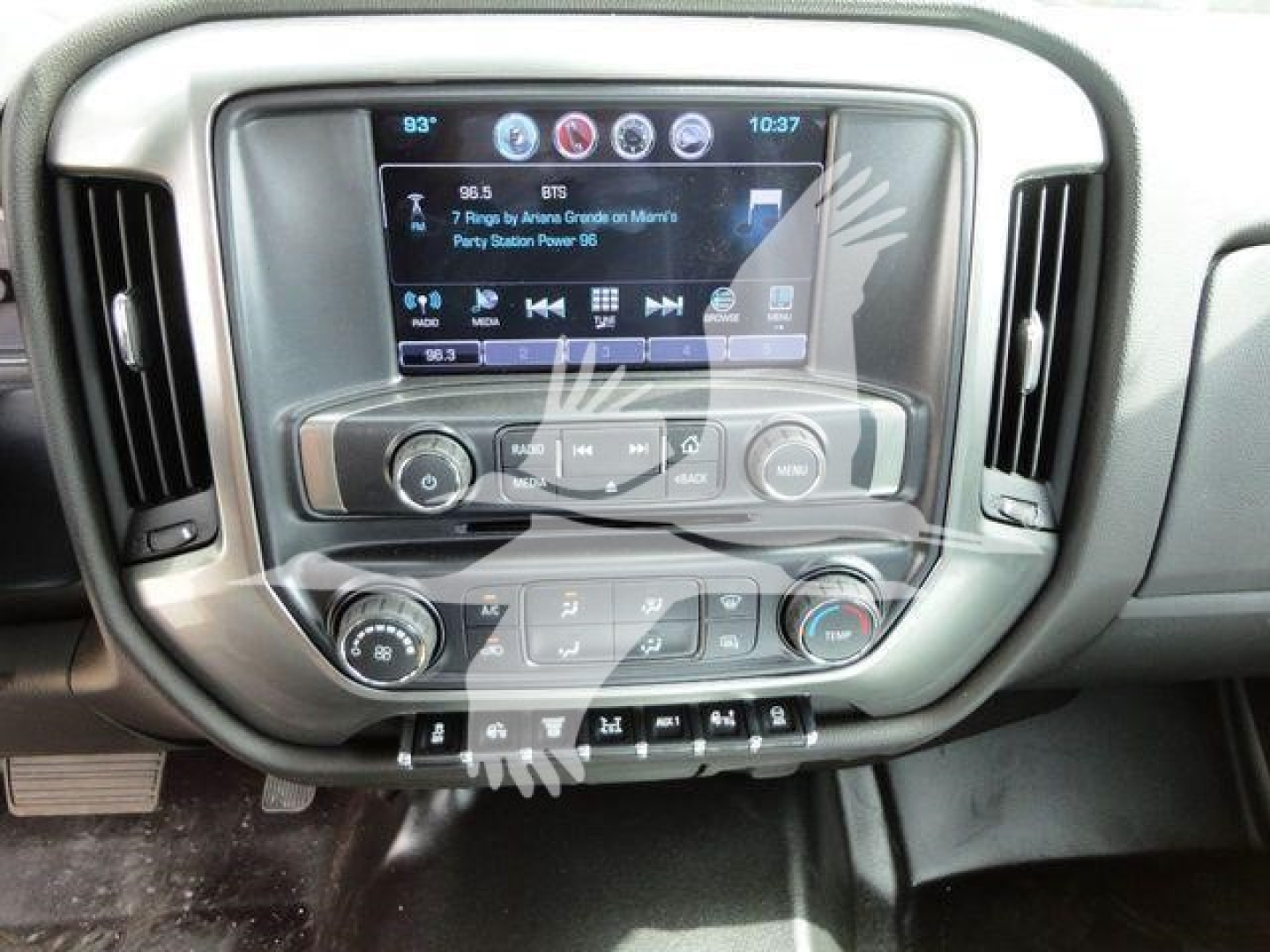 Chevrolet Silverado 6500HD dashboard and infotainment screen showing touchscreen controls and climate dials.