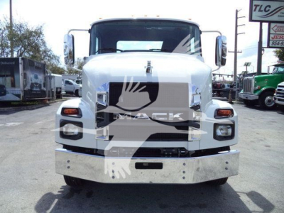 Front view of a white 2027 Mack MD6 truck with chrome bumper and grille, large rectangular headlamps, and side mirrors. Watermark from seller overlaying center.
