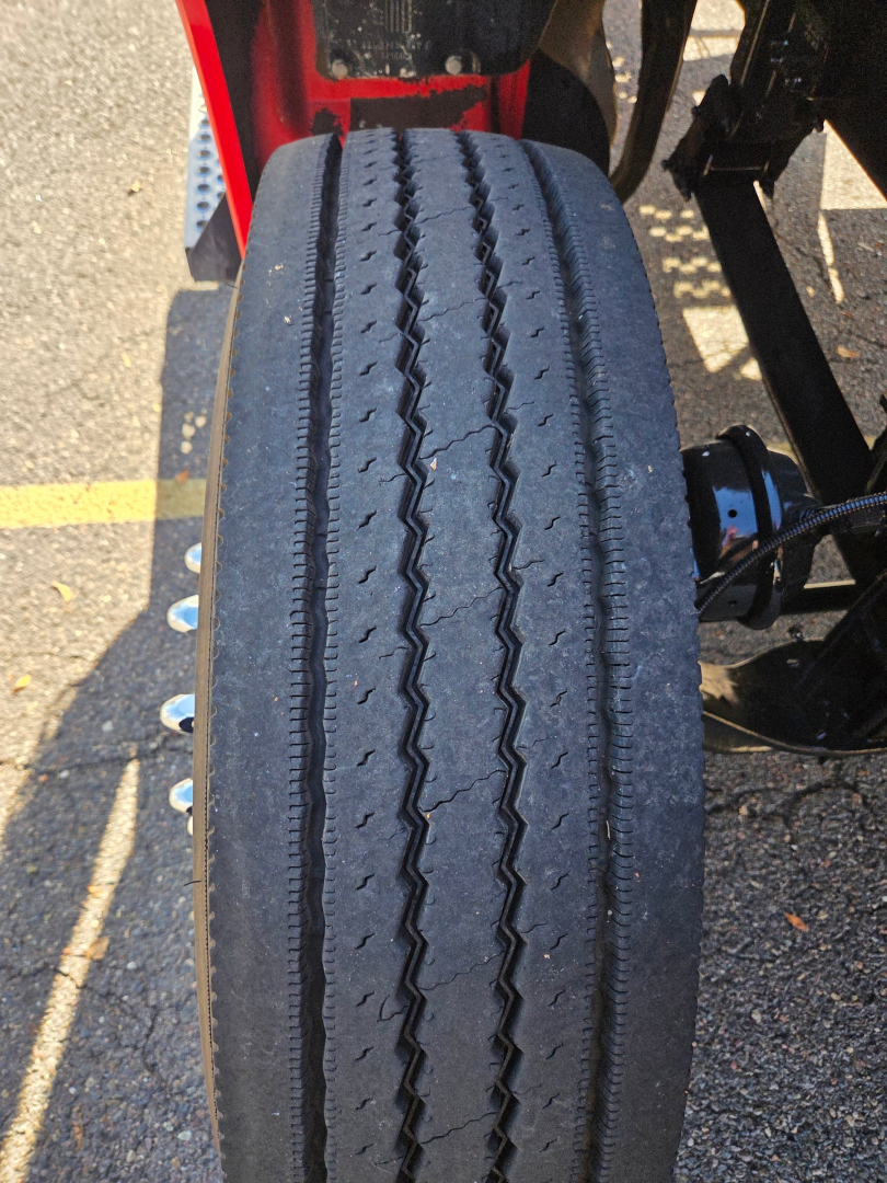 Tire of 2020 Kenworth T880 conventional daycab showing tread and wheel assembly