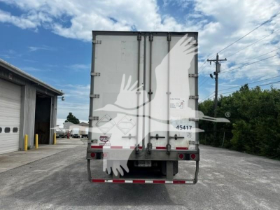 Rear view of a 2017 Wabash van trailer showing two rear doors and taillights.