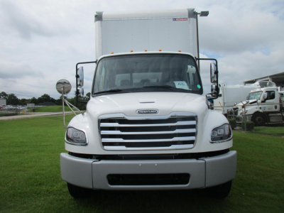 Freightliner M2 106 front view showing grille, bumper, headlights, side mirrors, and box truck cab; no visible text on the cab from this angle.